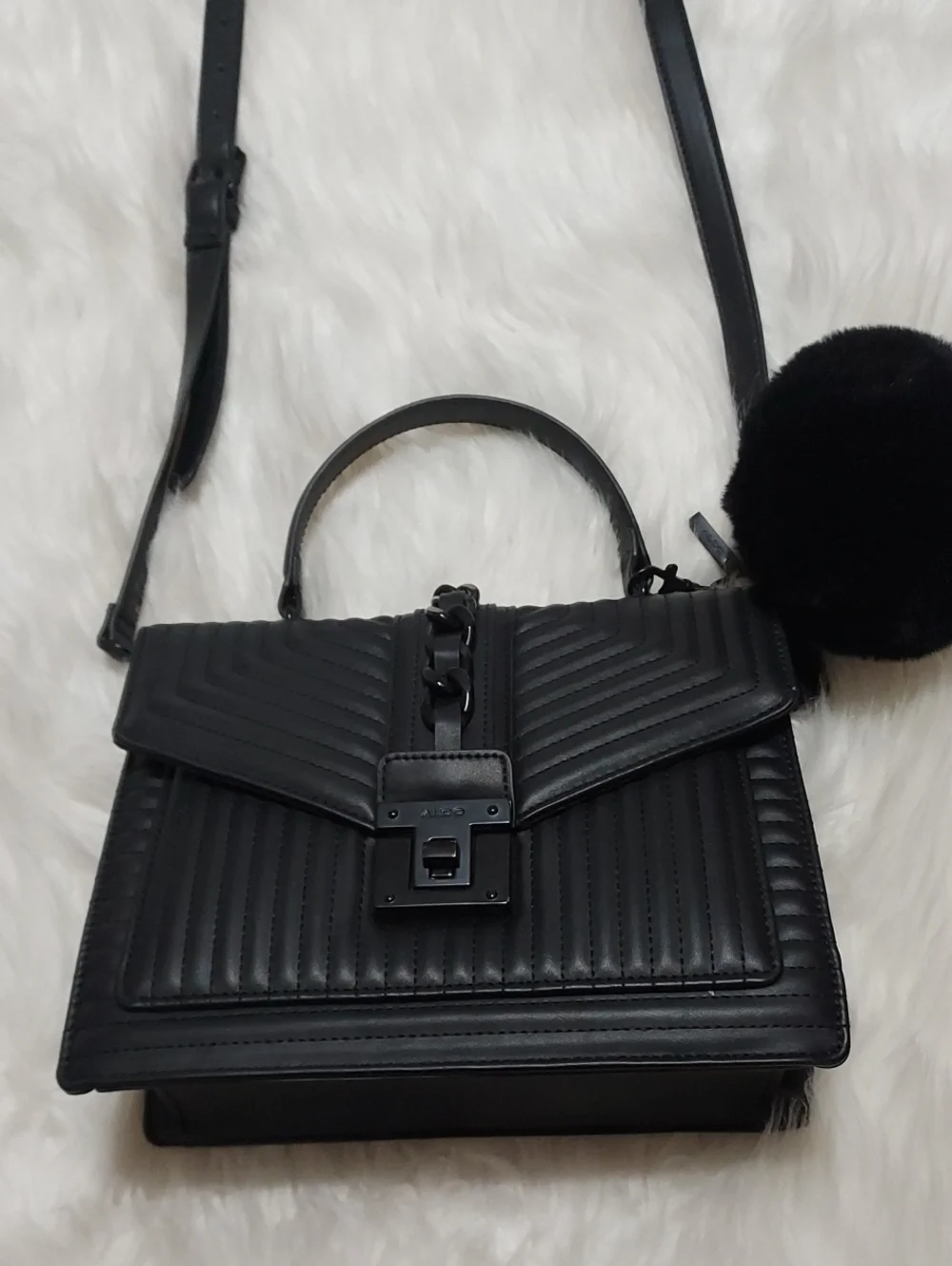 ALDO Chic Black Quilted Top-Handle Satchel with Pom Accent